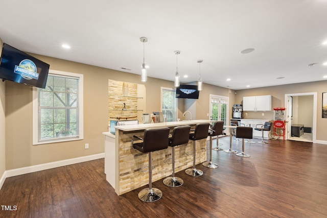 7632 Summer Pines Way, Wake Forest, NC 27587 - bar featuring dark wood-type flooring, recessed lighting, and hanging light fixtures
