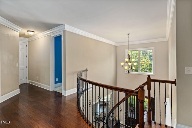 7632 Summer Pines Way, Wake Forest, NC 27587 - hallway with an upstairs landing, a chandelier, dark wood-type flooring, and crown molding