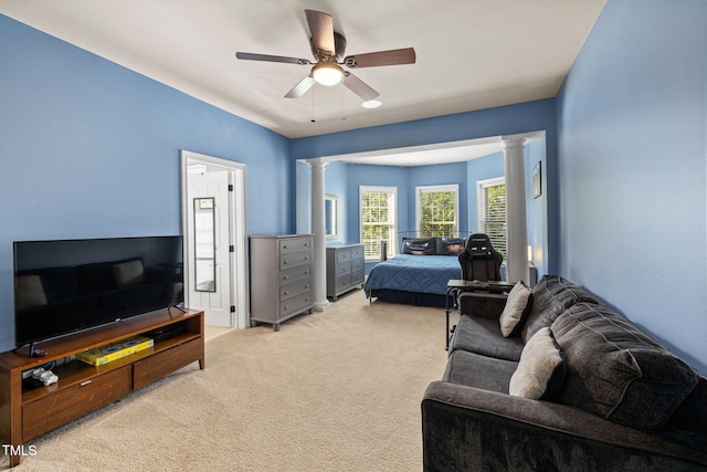 7632 Summer Pines Way, Wake Forest, NC 27587 - bedroom with decorative columns, light carpet, and ceiling fan