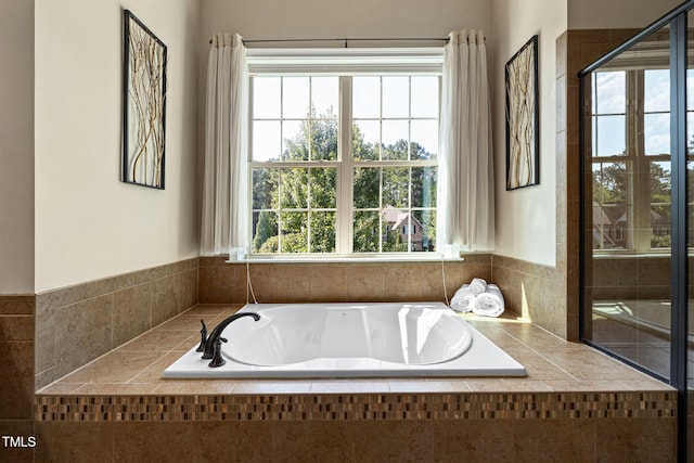 7632 Summer Pines Way, Wake Forest, NC 27587 - bathroom with plenty of natural light, a jetted tub, and a shower stall