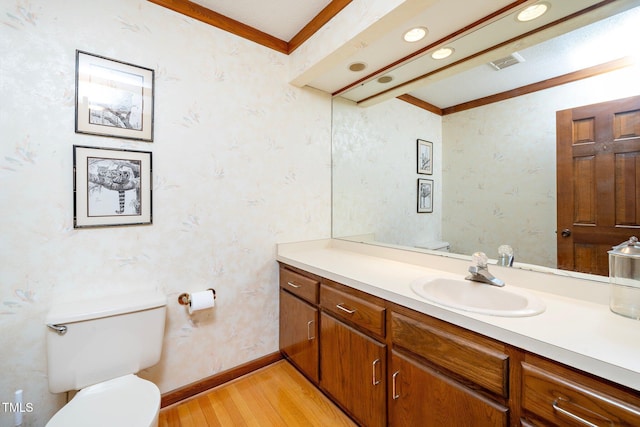 403 Rutherglen Dr, Cary, NC 27511 - bathroom with toilet, wood finished floors, vanity, ornamental molding, and baseboards