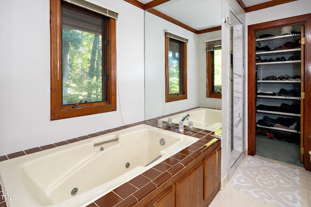 403 Rutherglen Dr, Cary, NC 27511 - full bath featuring a whirlpool tub, a walk in closet, crown molding, and tile patterned floors
