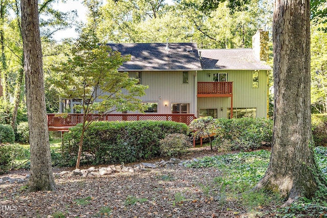 403 Rutherglen Dr, Cary, NC 27511 - rear view of property with a chimney, a balcony, and roof with shingles
