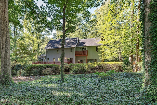 403 Rutherglen Dr, Cary, NC 27511 - back of house with roof with shingles and a balcony