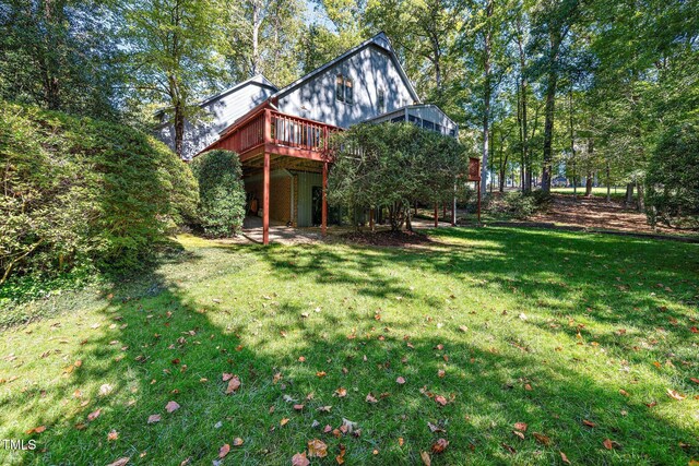 403 Rutherglen Dr, Cary, NC 27511 - view of grassy yard with a wooden deck