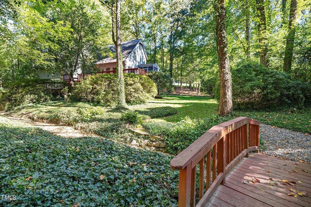 403 Rutherglen Dr, Cary, NC 27511 - view of green lawn with a wooden deck