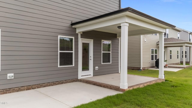 3500 Bailey Lake Dr, Fuquay Varina, NC 27526 - entrance to property with a patio area and a lawn