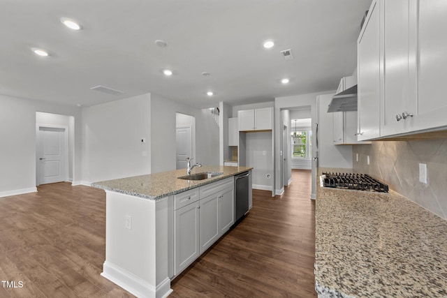3500 Bailey Lake Dr, Fuquay Varina, NC 27526 - kitchen featuring appliances with stainless steel finishes, dark wood-style flooring, white cabinets, light stone counters, and recessed lighting