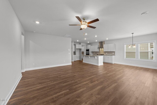 3500 Bailey Lake Dr, Fuquay Varina, NC 27526 - unfurnished living room featuring ceiling fan, dark wood finished floors, and recessed lighting