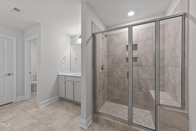 3500 Bailey Lake Dr, Fuquay Varina, NC 27526 - bathroom featuring vanity, a stall shower, and tile patterned floors