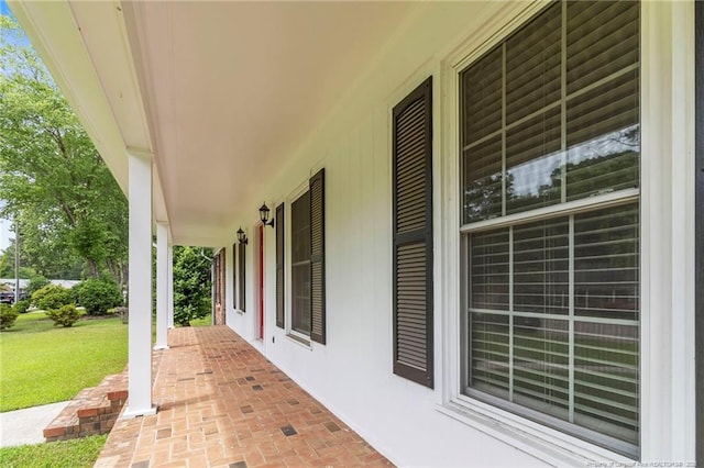 239 Rainier Dr, Fayetteville, NC 28314 - covered porch with a yard