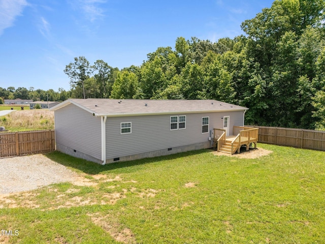 130 Ruby Trl, Roxboro, NC 27574 - back of property with crawl space, a wooden deck, and roof with shingles