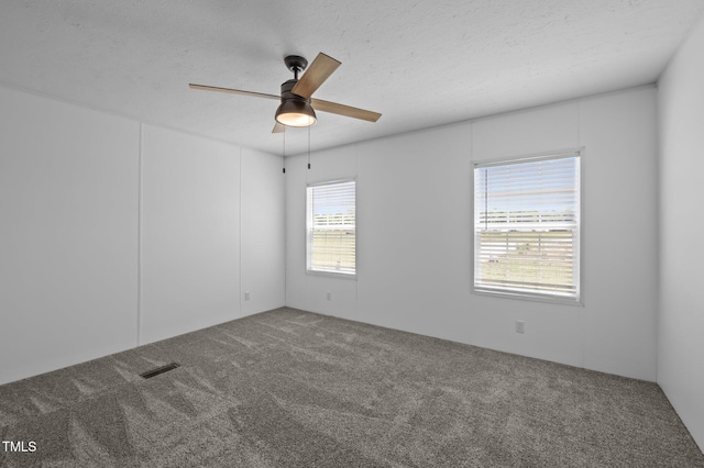 130 Ruby Trl, Roxboro, NC 27574 - carpeted spare room with a ceiling fan