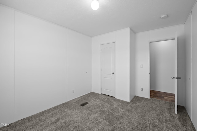 130 Ruby Trl, Roxboro, NC 27574 - unfurnished bedroom with carpet flooring