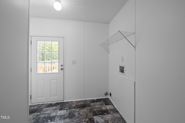 130 Ruby Trl, Roxboro, NC 27574 - laundry room with hookup for a washing machine and a textured ceiling