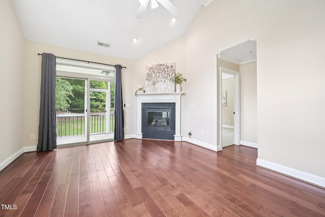 1090 Indigo Ridge Pl, Cary, NC 27519 - unfurnished living room with lofted ceiling, hardwood / wood-style floors, ceiling fan, and a glass covered fireplace