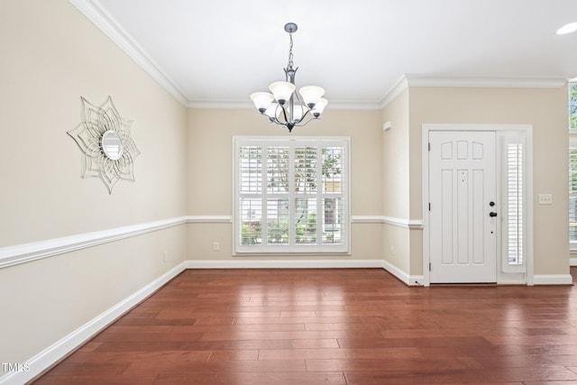 1090 Indigo Ridge Pl, Cary, NC 27519 - foyer featuring a chandelier, hardwood / wood-style flooring, and ornamental molding