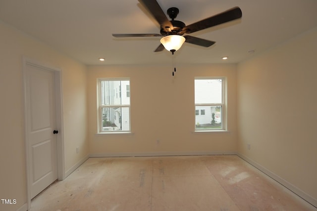 6973 Doddridge Ln Unit 17, Cary, NC 27519 - spare room with plenty of natural light, baseboards, ceiling fan, and recessed lighting