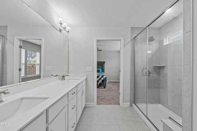 309 Highland Forest Dr, Fuquay Varina, NC 27526 - full bathroom featuring connected bathroom, plenty of natural light, double vanity, and baseboards