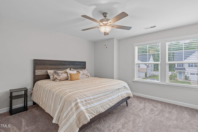 309 Highland Forest Dr, Fuquay Varina, NC 27526 - bedroom featuring carpet flooring, baseboards, and a ceiling fan
