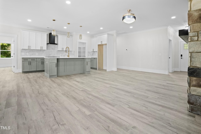 107 Mohave Dr, Louisburg, NC 27549 - kitchen featuring baseboards, open floor plan, tasteful backsplash, ornamental molding, and range hood
