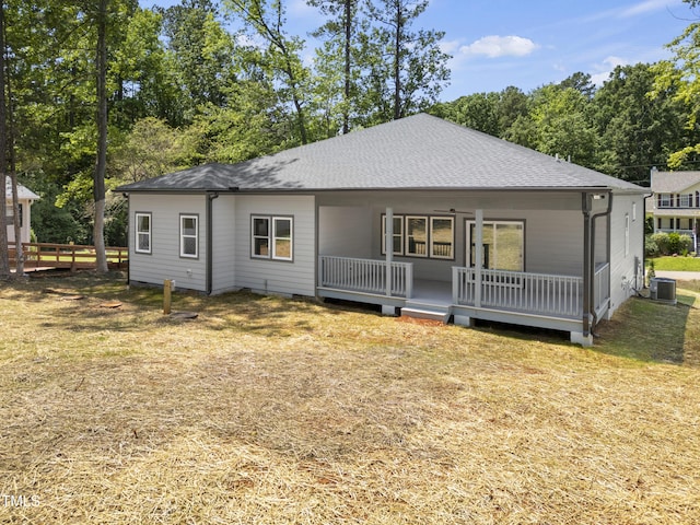 107 Mohave Dr, Louisburg, NC 27549 - rear view of property with roof with shingles and central AC
