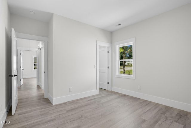 107 Mohave Dr, Louisburg, NC 27549 - unfurnished bedroom featuring light wood-type flooring and baseboards