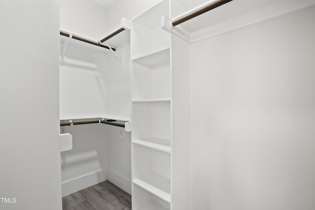 107 Mohave Dr, Louisburg, NC 27549 - spacious closet featuring wood finished floors