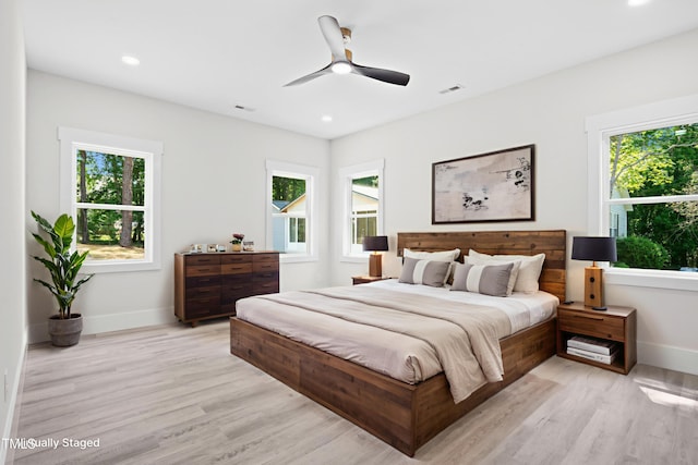 107 Mohave Dr, Louisburg, NC 27549 - bedroom with baseboards, light wood-type flooring, recessed lighting, and a ceiling fan