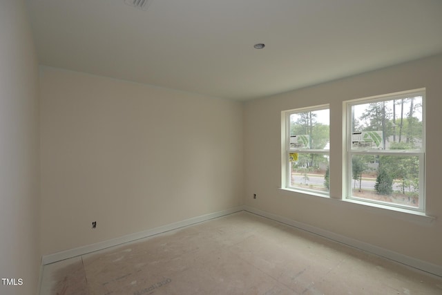7106 Hubner Pl Unit 44, Cary, NC 27519 - spare room featuring baseboards