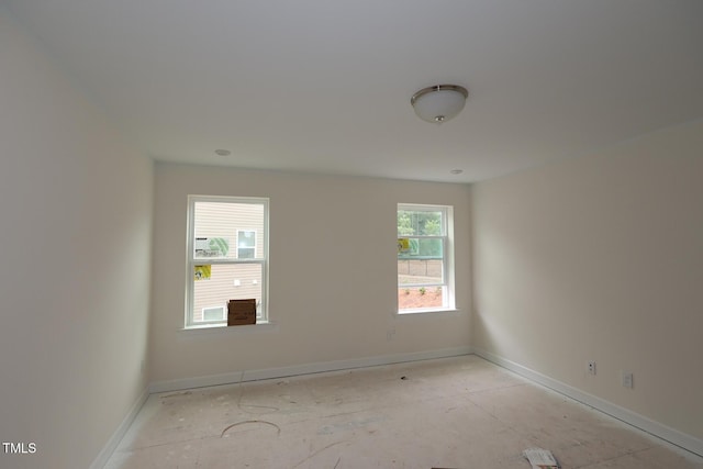 7106 Hubner Pl Unit 44, Cary, NC 27519 - spare room featuring baseboards