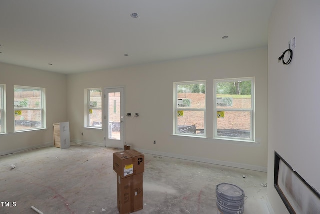 7106 Hubner Pl Unit 44, Cary, NC 27519 - unfurnished living room featuring baseboards