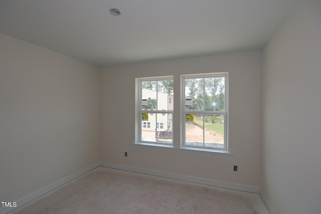 7106 Hubner Pl Unit 44, Cary, NC 27519 - spare room featuring baseboards