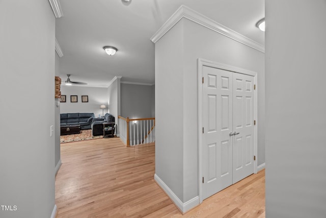 4511 Crab Creek Dr Unit 101, Raleigh, NC 27612 - hall with ornamental molding, an upstairs landing, and light wood-type flooring