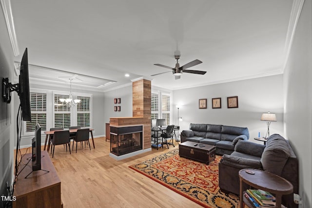 4511 Crab Creek Dr Unit 101, Raleigh, NC 27612 - living area with crown molding, plenty of natural light, light wood finished floors, a ceiling fan, and recessed lighting