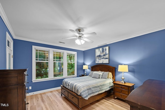 4511 Crab Creek Dr Unit 101, Raleigh, NC 27612 - bedroom featuring light wood-style floors, crown molding, and a ceiling fan