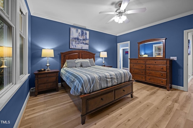 4511 Crab Creek Dr Unit 101, Raleigh, NC 27612 - bedroom with light wood-style flooring, ornamental molding, and ceiling fan