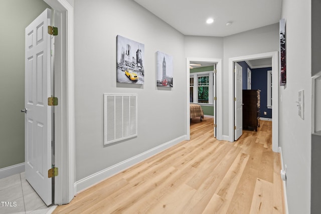 4511 Crab Creek Dr Unit 101, Raleigh, NC 27612 - hall with baseboards and wood finished floors