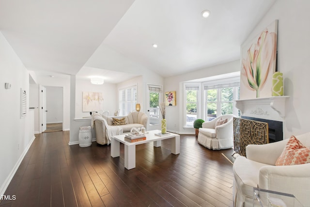 911 Washington St Unit 304, Raleigh, NC 27605 - living area with a fireplace, baseboards, dark wood finished floors, recessed lighting, and vaulted ceiling