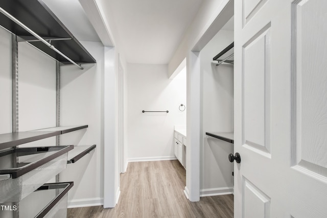 911 Washington St Unit 304, Raleigh, NC 27605 - walk in closet with wood finished floors