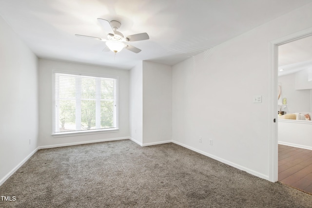 911 Washington St Unit 304, Raleigh, NC 27605 - spare room featuring ceiling fan, carpet floors, and baseboards