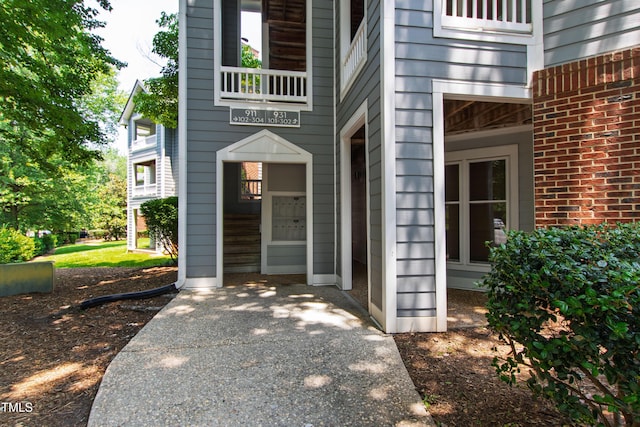 911 Washington St Unit 304, Raleigh, NC 27605 - view of exterior entry with brick siding