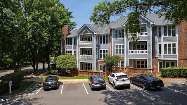 911 Washington St Unit 304, Raleigh, NC 27605 - view of property featuring uncovered parking