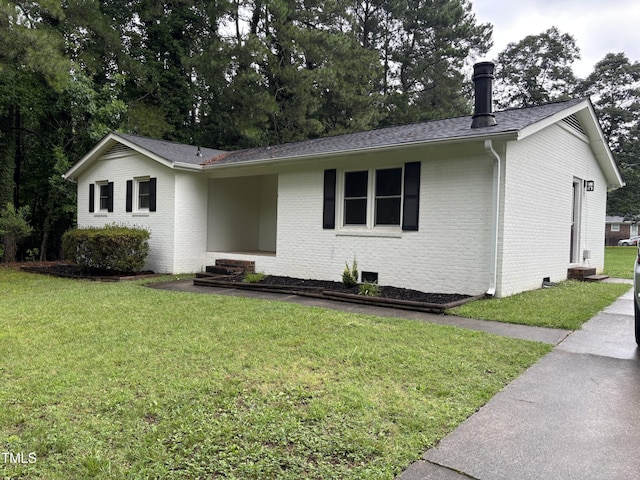 301 Roseland Ave, Durham, NC 27712 - ranch-style home with brick siding and a front lawn
