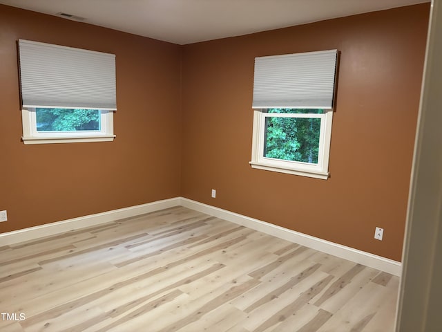 301 Roseland Ave, Durham, NC 27712 - spare room featuring healthy amount of natural light and light wood-type flooring