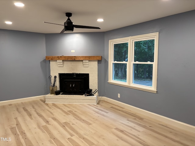301 Roseland Ave, Durham, NC 27712 - unfurnished living room with wood finished floors, recessed lighting, ceiling fan, and a fireplace