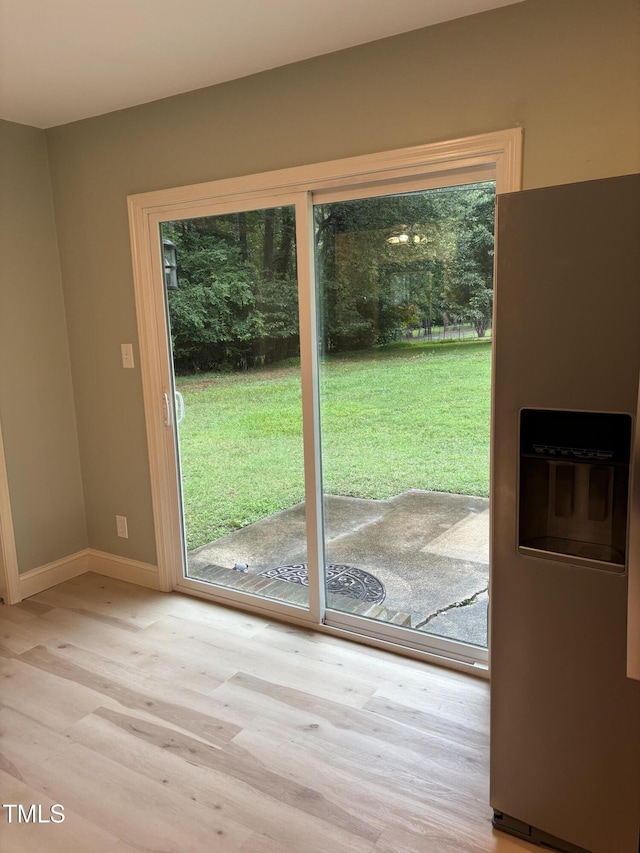 301 Roseland Ave, Durham, NC 27712 - doorway featuring light wood-style floors and baseboards