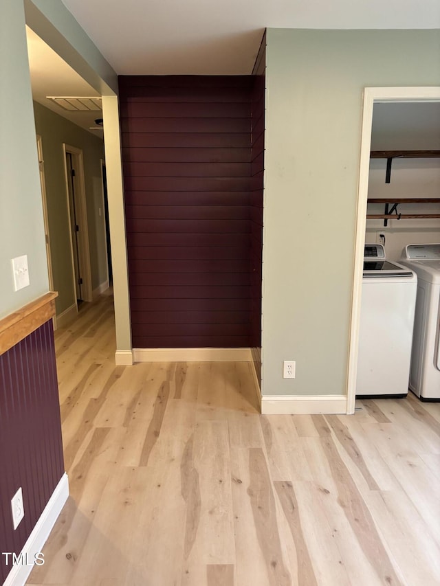 301 Roseland Ave, Durham, NC 27712 - hallway featuring washer and dryer and light wood finished floors