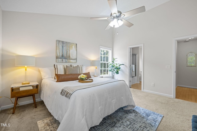 508 Hidden Cellars Dr, Holly Springs, NC 27540 - bedroom featuring carpet flooring, high vaulted ceiling, ensuite bathroom, and ceiling fan