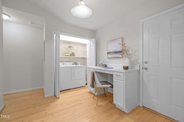 508 Hidden Cellars Dr, Holly Springs, NC 27540 - office space featuring washer and dryer, light wood-style flooring, and built in desk